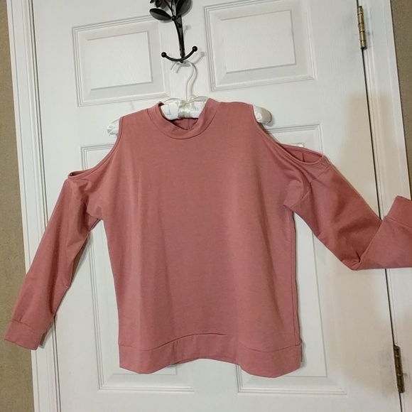 Charming Charlie Tops - Charming Charlie's pink long sleeved cold shoulder